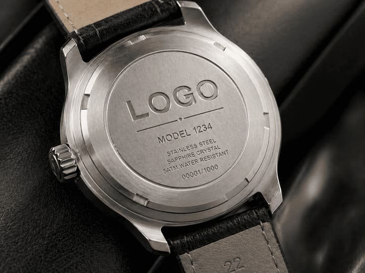 Case back engraving example showing brand and model specification