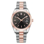 Close-up of a luxury wristwatch with silver and rose gold accents, featuring a black dial, date display, and a sleek metal bracelet.